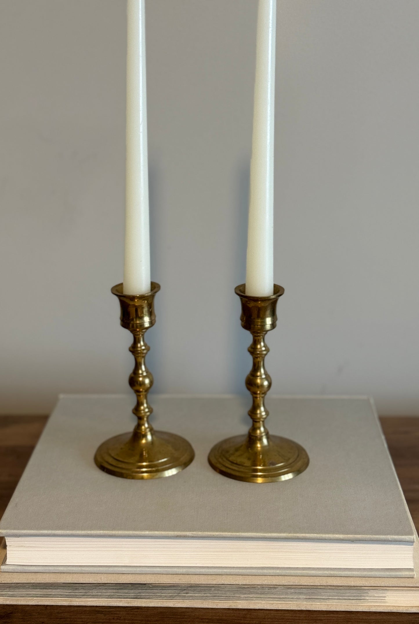 Pair tall brass candle holders