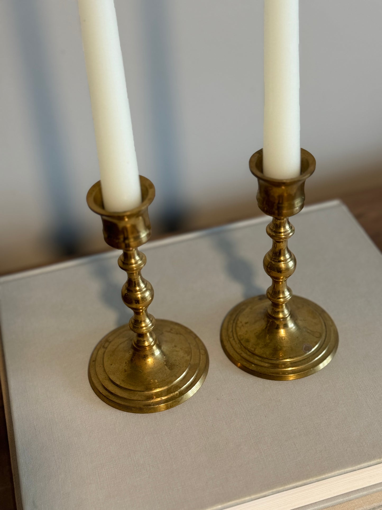 Pair tall brass candle holders