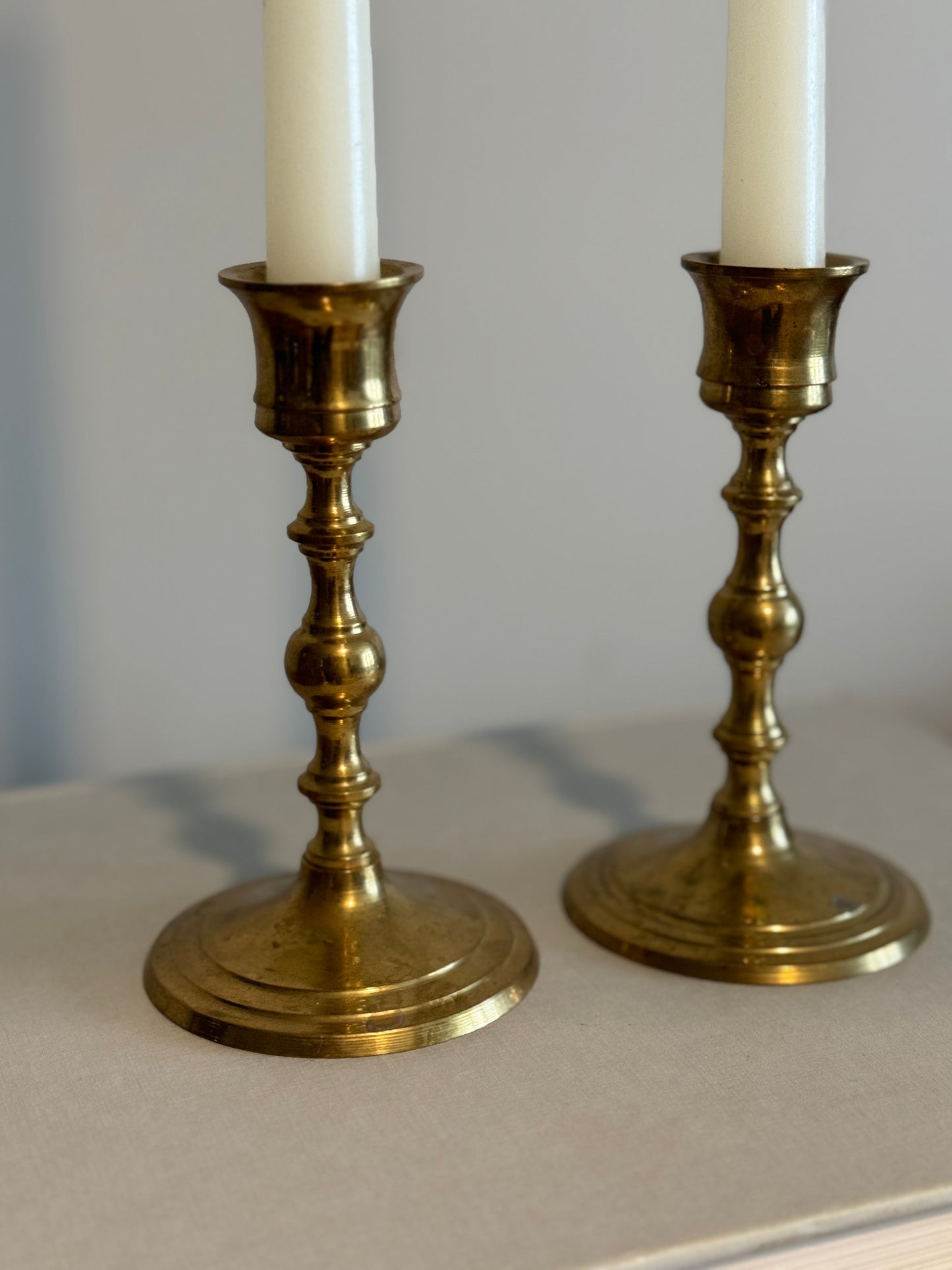Pair tall brass candle holders