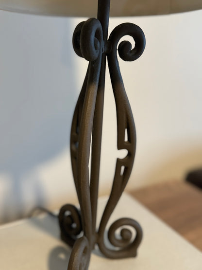 Wrought iron lamp with gathered linen shade