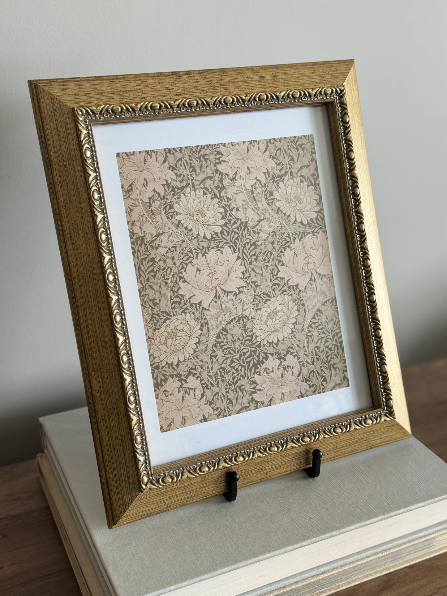 Green floral print in gold frame