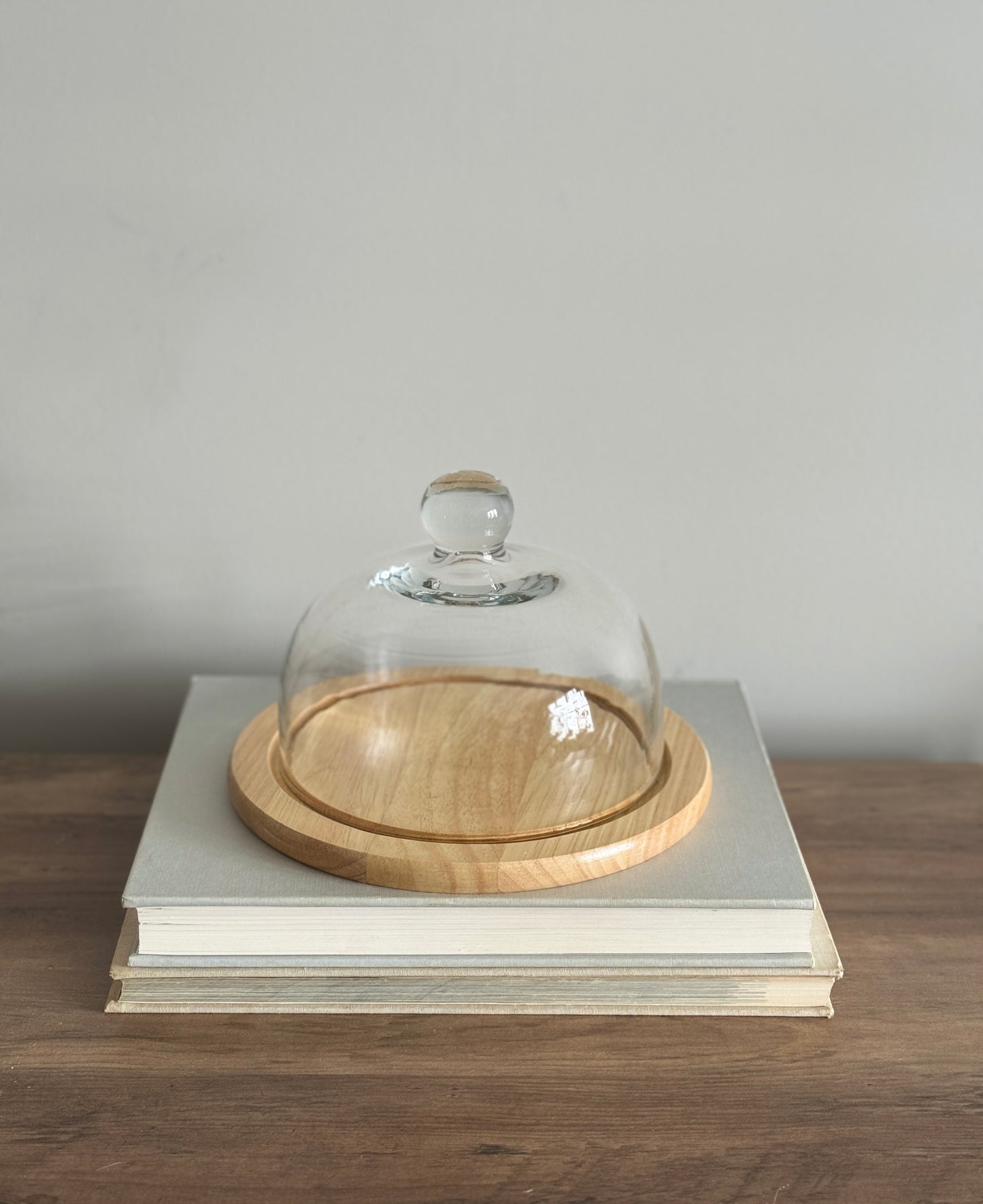 Glass cloche with wood base