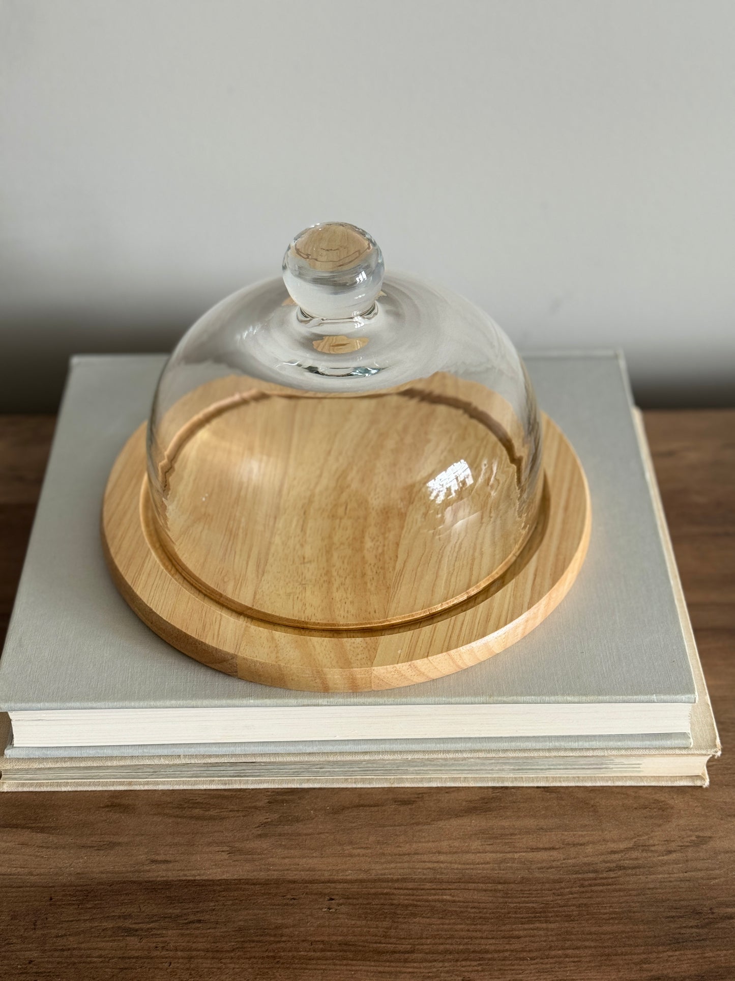 Glass cloche with wood base