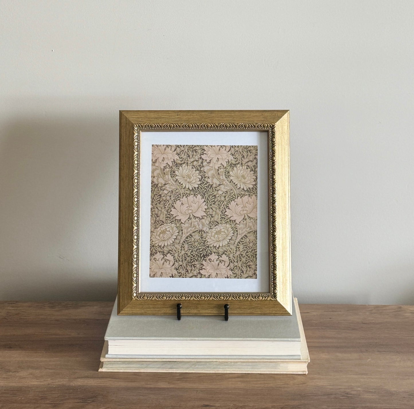 Green floral print in gold frame